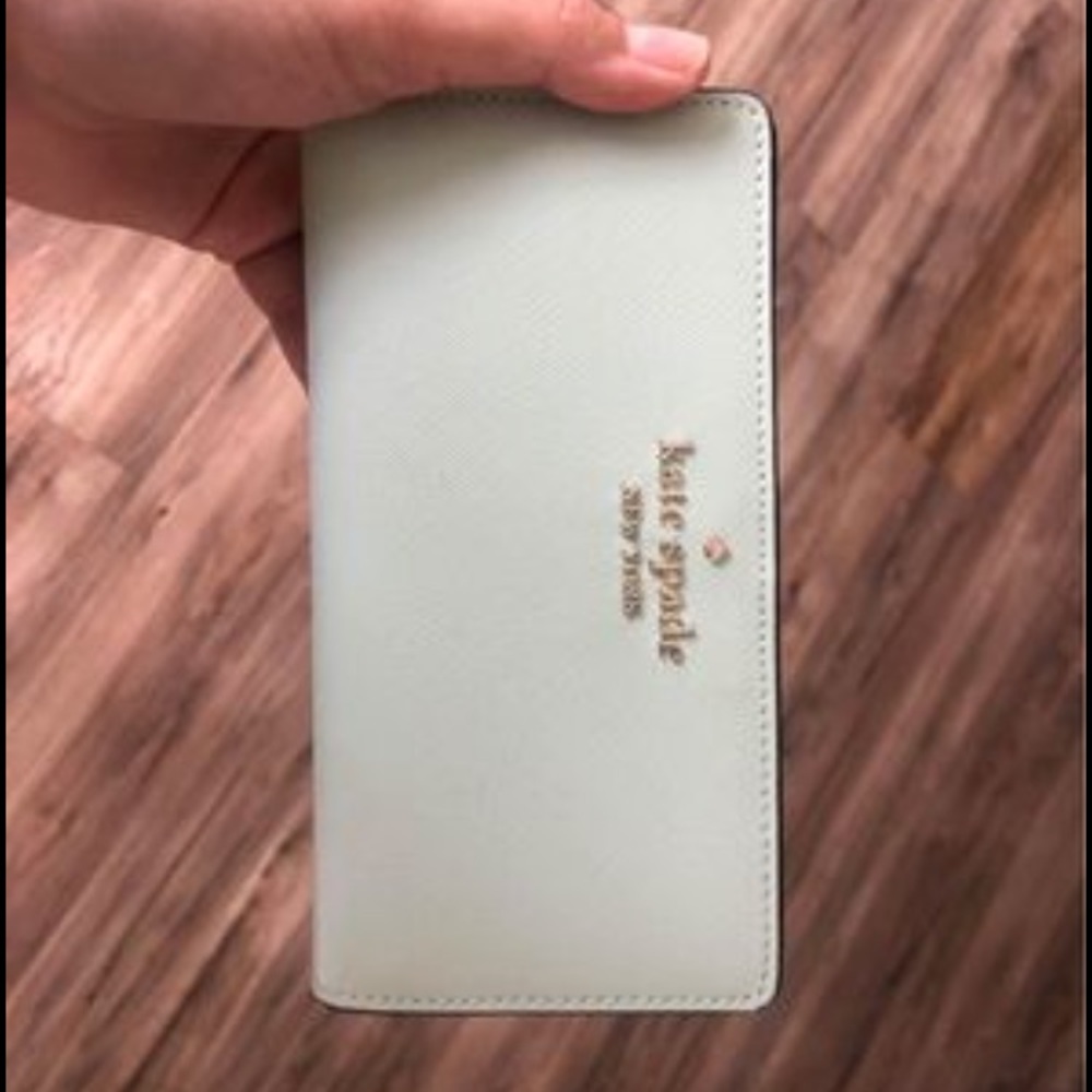 Kate spade staci large slim bifold wallet. Crystal blue (light mint)